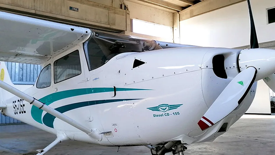 Close-up of a training aircraft in a hangar ready for scheduled maintenance